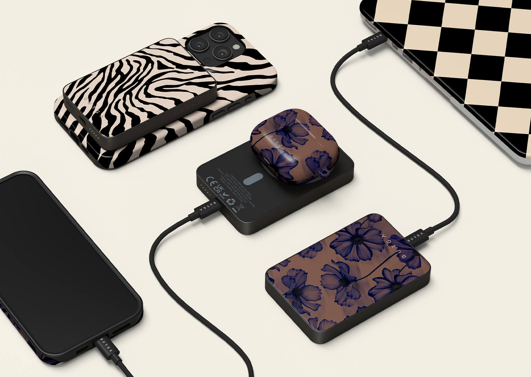 Stylish phone and device chargers with zebra and floral patterns, connected to various electronics.